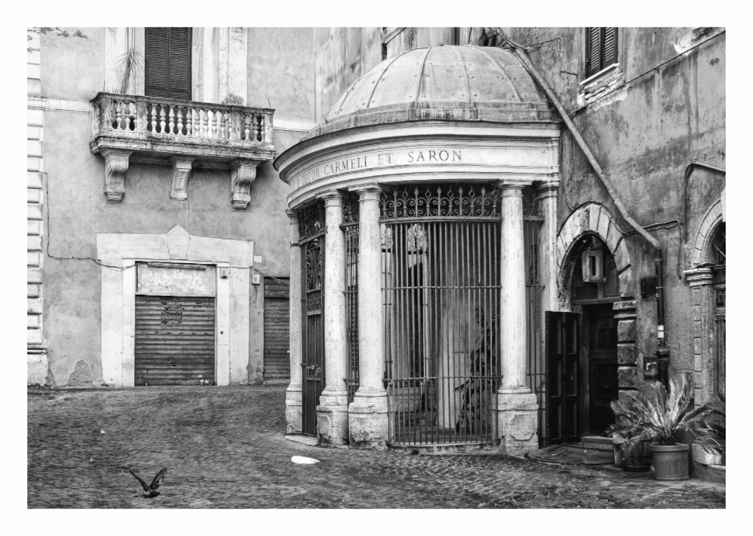 Square in Rome print, 130.5 × 90 cm with white border — small domed chapel with classical columns on a cobbled piazza, Trastevere, Rome, black and white architecture photography by Tom Parsons