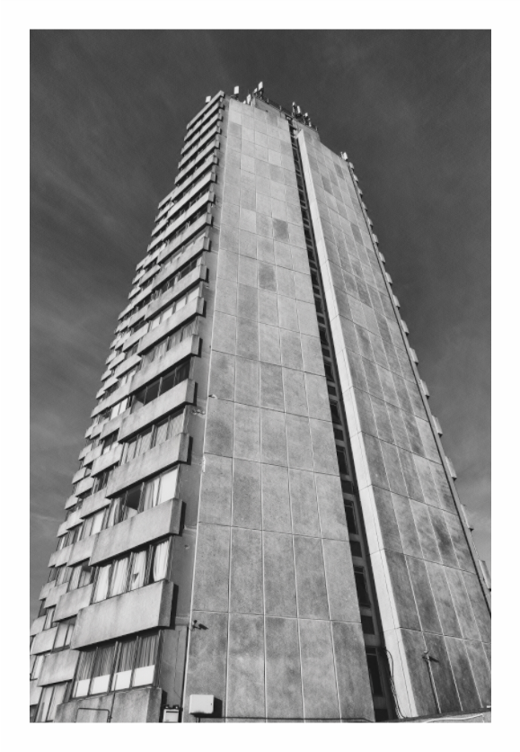 Arlington House print, 80 × 120 cm with white border — brutalist tower block seen at an angle against a cloudy sky, Margate, black and white architectural photography by Tom Parsons