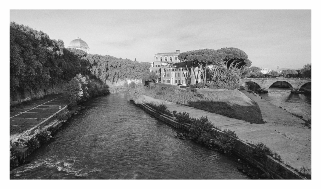 Fatebenefratelli Hospital print, 160 × 90 cm with white border — Tiber Island and the hospital seen along the river bend, black and white Rome architecture photography by Tom Parsons