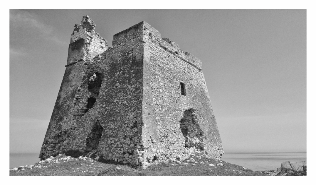 Fortification (2) print, 160 × 90 cm with white border — ruined medieval stone watchtower against a clear sky, Puglia, Italy, black and white landscape photography by Tom Parsons