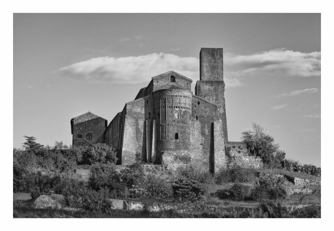 San Pietro print, 120 × 80 cm with white border — the Romanesque basilica on its Etruscan hilltop acropolis, Tuscania, Lazio, black and white architectural photography by Tom Parsons