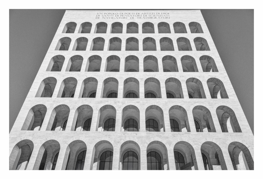 Palazzo della Civiltà Italiana print, 136.8 × 90 cm with white border — the repeating arched facade viewed from below, Rome, black and white architectural photography by Tom Parsons