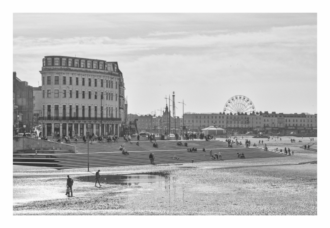 Margate print, 120 × 80 cm with white border — Margate seafront with Victorian buildings and a Ferris wheel seen from the harbour arm, Kent, black and white street photography by Tom Parsons
