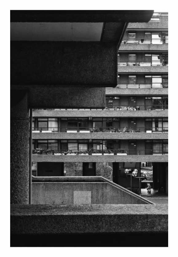 Barbican Centre print, 80 × 120 cm with white border — the Barbican Centre's terraces and residential balconies above a walkway, London, black and white architecture photography by Tom Parsons