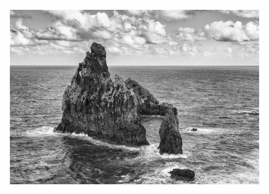 Madeira Coast print, 126 × 90 cm with white border — dramatic sea stacks and breaking waves off the Madeira coast, black and white landscape photography by Tom Parsons