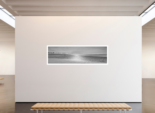 Framed black and white print of Camber Sands beach, 244 x 70 cm, displayed on a gallery wall, by Tom Parsons